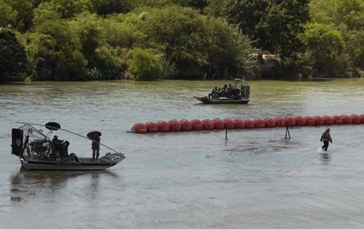 Mexico recovers 2 bodies from the Rio Grande, including one near floating barrier installed by Texas