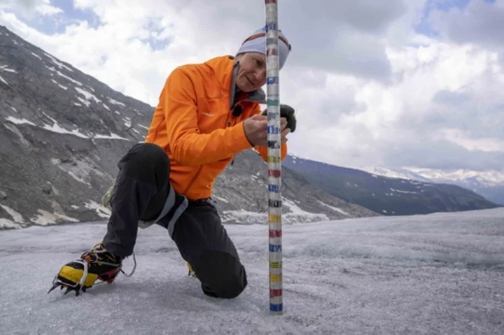 As thaw accelerates, Swiss glaciers lost 10% of their volume in the last 2 years, experts say