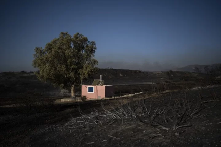 Exclusion zone set up around Greek military base after wildfires trigger powerful explosions