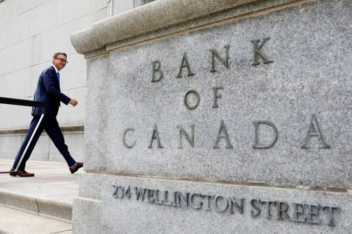 Bank of Canada leaves rates on hold, sees weak growth and stubborn prices