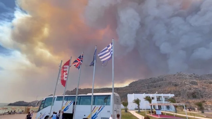 Greece fires: Thousands flee homes and hotels on Rhodes as fires spread