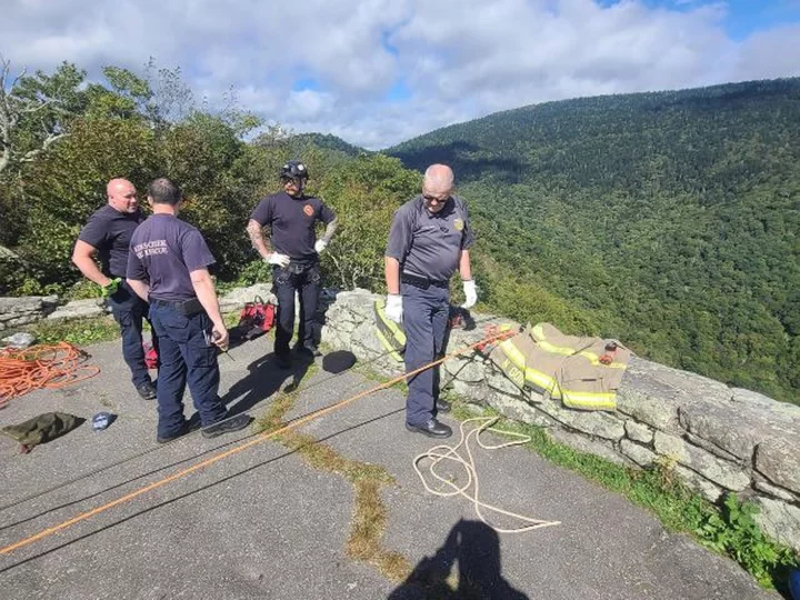 A woman died after falling more than 100 feet from a waterfall overlook on the Blue Ridge Parkway in North Carolina