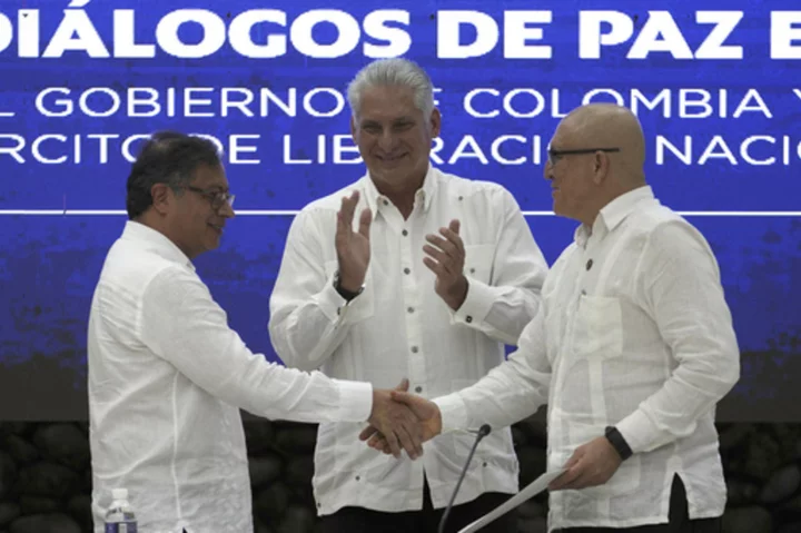 Colombian rebel group says it will stop attacks on military