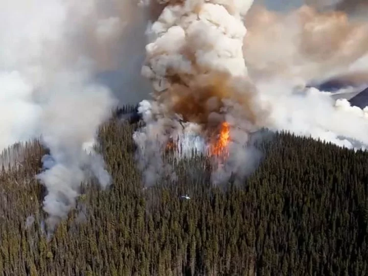 As wildfires gobble more Canadian acreage, crews struggle to even keep up