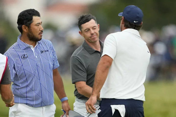 McIlroy, Koepka shake hands and smile, then turn to chasing down leaders at US Open