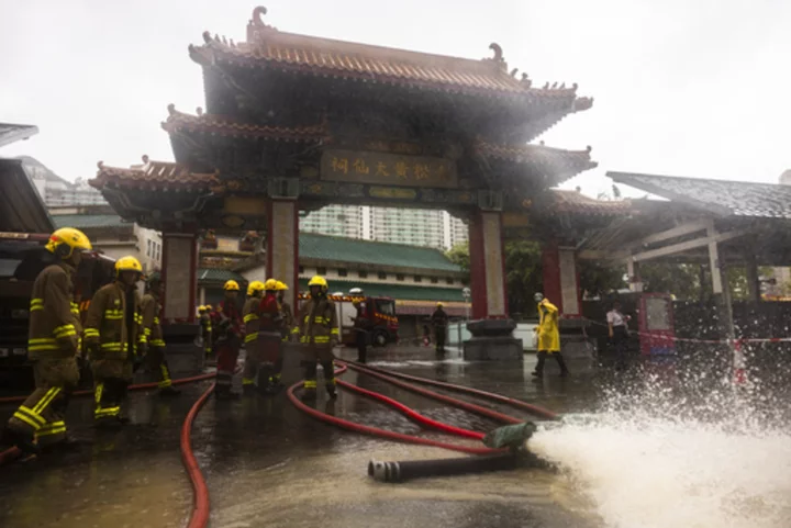 7 people have died in storms in southern China and 70 crocodiles are reported to be on the loose