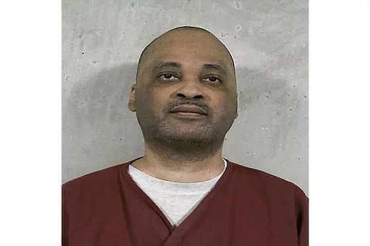 Oklahoma executes a man for the 1995 butcher knife slaying of a Tulsa woman