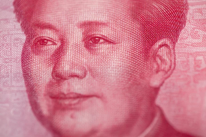 Yuan Slides Past Seven Per Dollar After China Data Disappoint