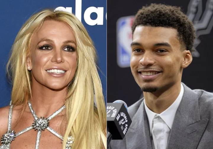 Video shows Britney Spears inadvertently hit herself in the face in encounter with Victor Wembanyama