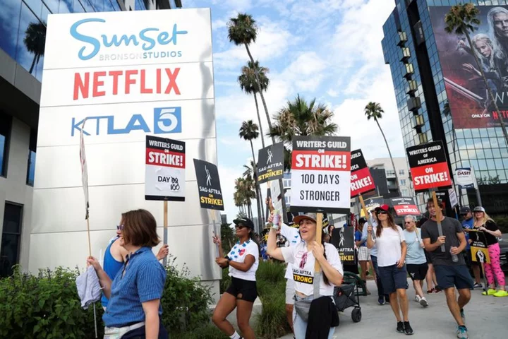 100-day strike: Hollywood writers show unity and anger on picket lines