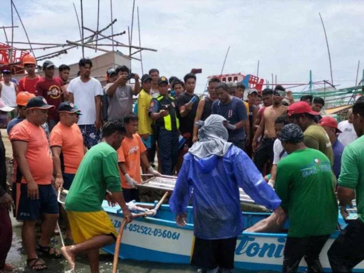 Philippines says three fishermen killed after boat struck by 'foreign' vessel in South China Sea