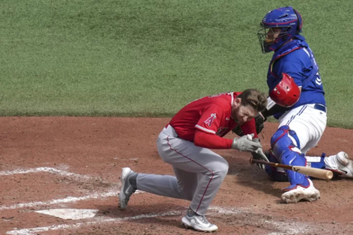 Angels outfielder Taylor Ward leaves game after being hit in head by Alek Manoah's pitch