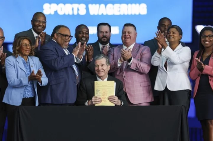 North Carolina governor signs sports, horse racing betting law; wagering could begin in early 2024