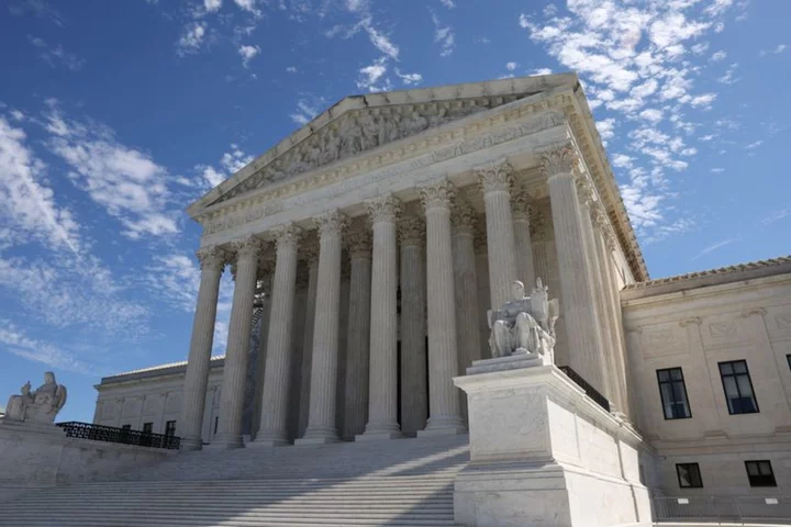 Under fire, US Supreme Court unveils ethics code for justices