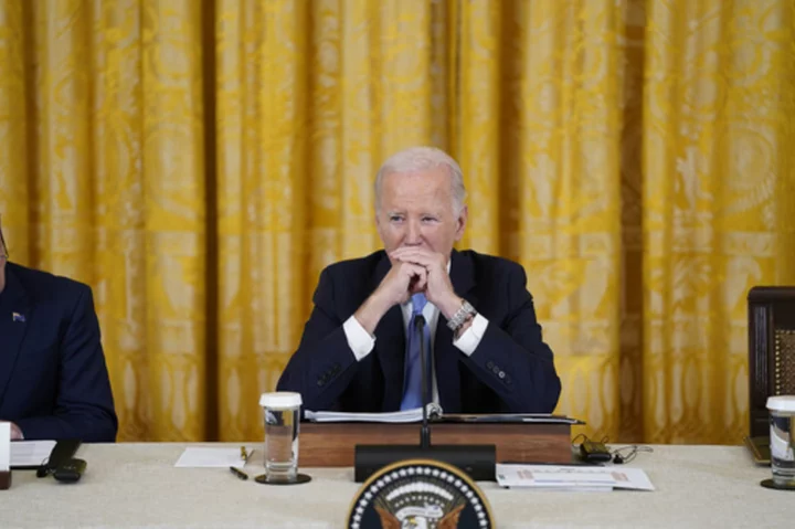 Biden tells Pacific islands leaders that he hears their warnings about climate change and will act