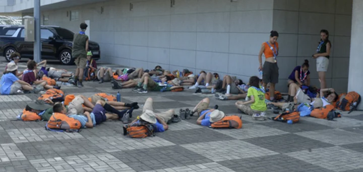 South Korea presses on with World Scout Jamboree as heat forces thousands to leave early