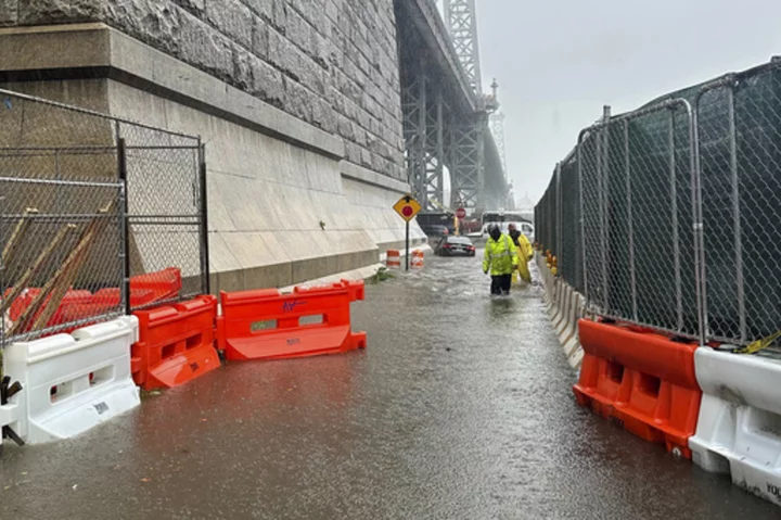 Storm pounds New York City area, flooding subways and leading to abandoned vehicles on the FDR Drive