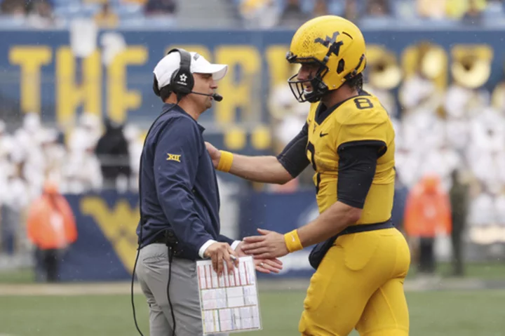 Nicco Marchiol throws TD pass in 1st start, West Virginia holds off Texas Tech 20-13