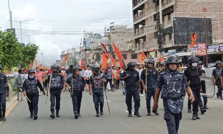 A Nepal town imposes a lockdown and beefs up security to prevent clashes between Hindus and Muslims