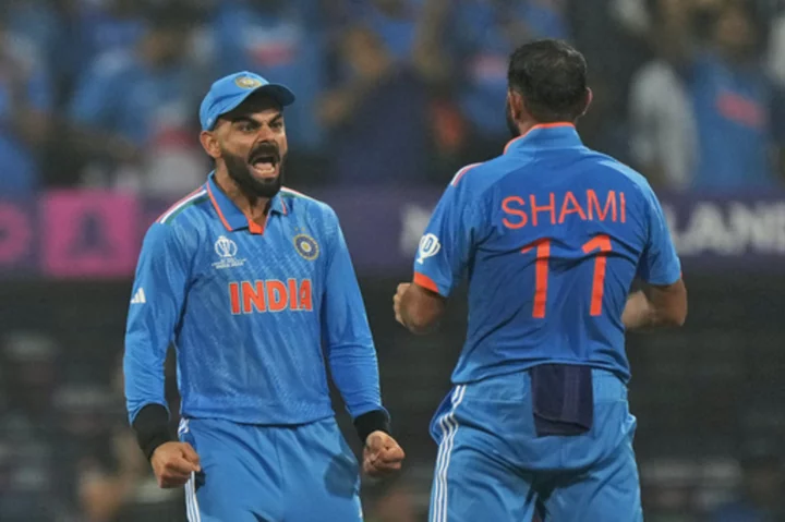 Kohli and Shami lead India into Cricket World Cup final after 70-run win over New Zealand