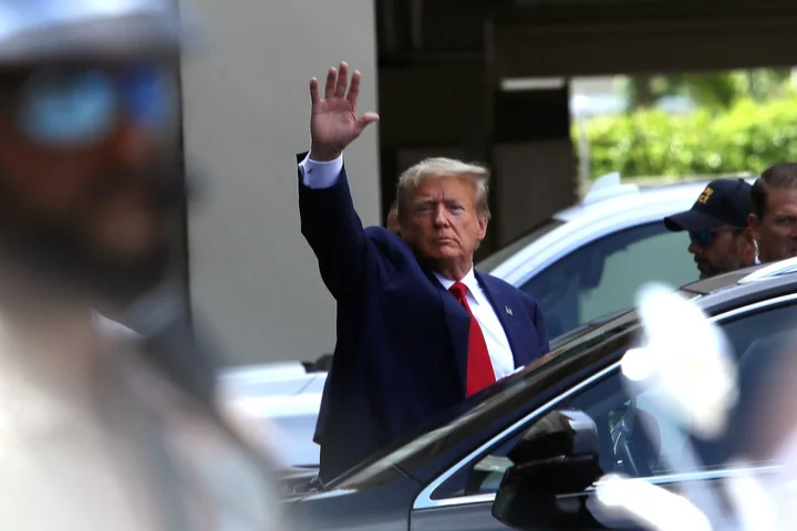 Trump indictment - live: Trump greets fans with free food after arrest, not guilty plea at Miami arraignment