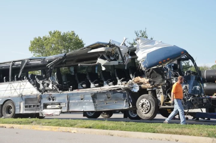 Greyhound bus crashes into tractor-trailers in Illinois, killing 3 and injuring 14, police say