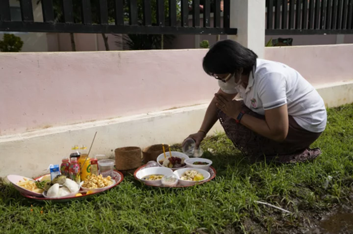 A modest Buddhist ceremony marks the anniversary of a day care center massacre in Thailand