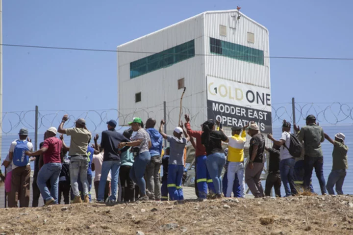 Miners from a rival union are holding hundreds of colleagues underground in South Africa, police say