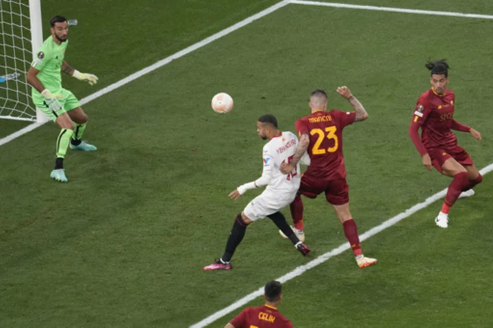 Penalty shootout at Europa League final with Roma, 6-time champ Sevilla tied at 1-1 after extra time