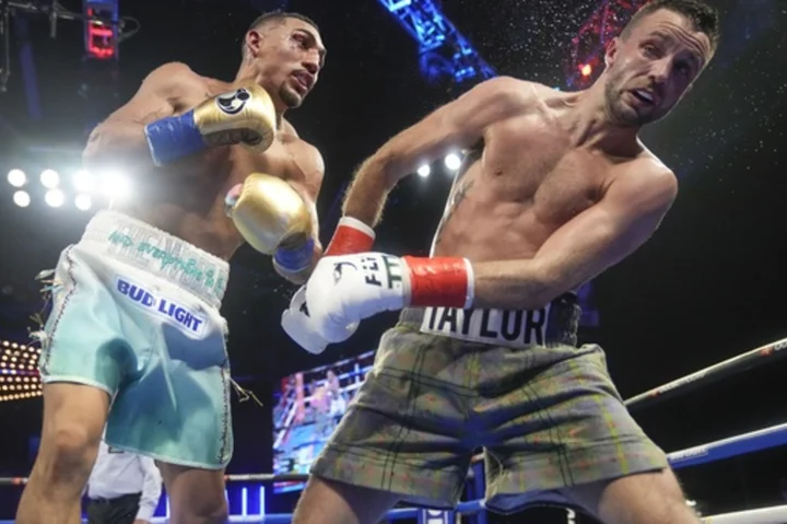 Teofimo Lopez beats Josh Taylor by unanimous decision, wins 140-pound title