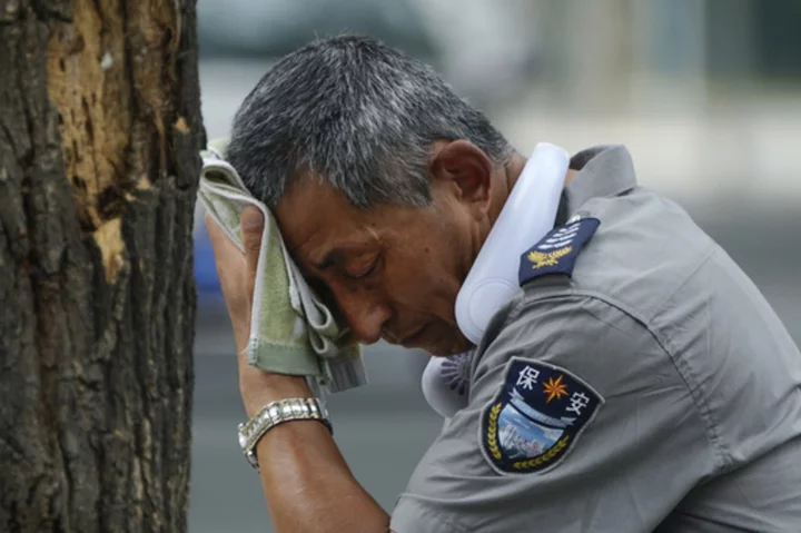 Beijing orders outdoor work to be halted as scorching summer heat soars