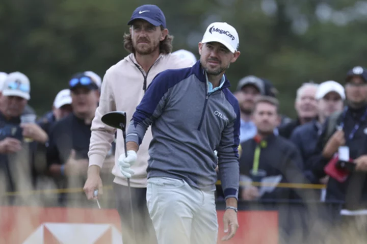 Harman steadies himself at British Open to keep a 5-shot lead over Young