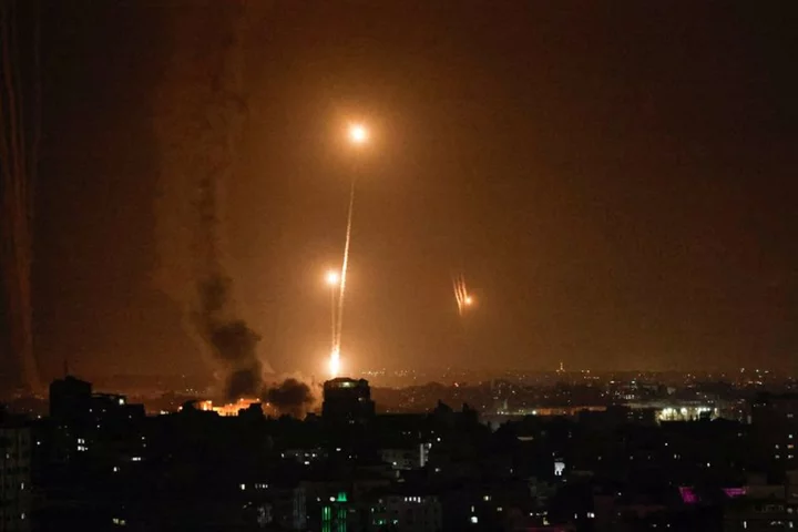 Israeli forces clash with Hamas gunmen after hundreds killed