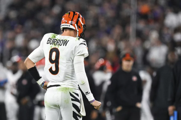 Joe Burrow is out for the rest of the season with a torn ligament in his right wrist