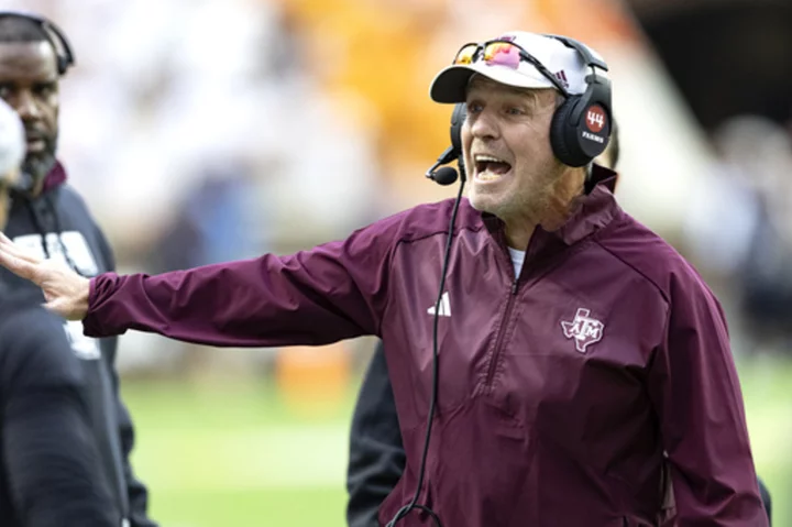 Texas A&M to fire Jimbo Fisher, a move that will cost the school $75M, AP source says