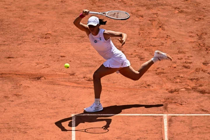 Swiatek fights off Muchova in thriller for third French Open title