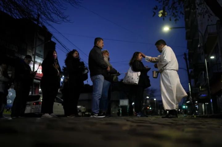 Argentines ask patron saint of work for jobs with elections around the corner