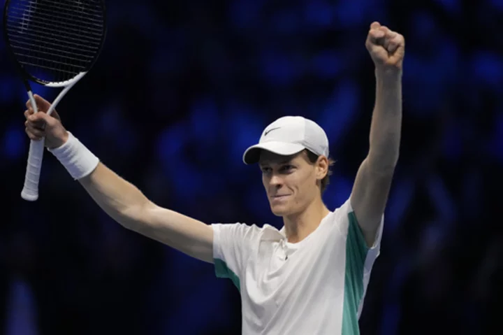 Home favorite Sinner records his first win over top-ranked Djokovic at ATP Finals