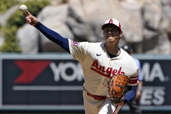 Shohei Ohtani won't pitch for rest of season because of a tear in a elbow ligament, Angels GM says