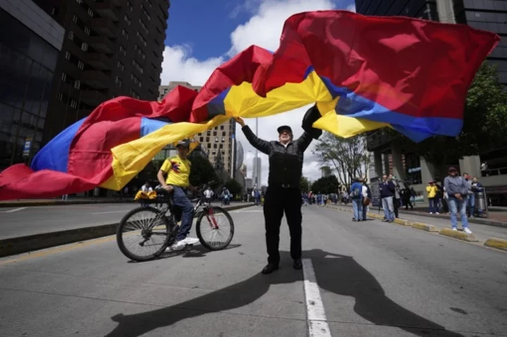 Thousands take to the streets in Colombia to protest leftist government's reforms