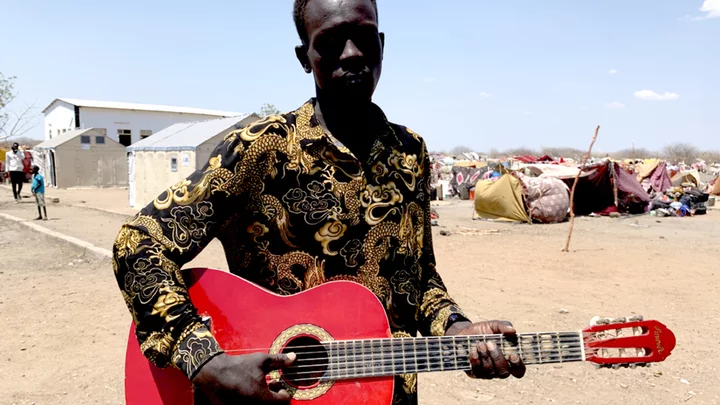 Sudan conflict: 'How I saved my red guitar from Khartoum war zone'