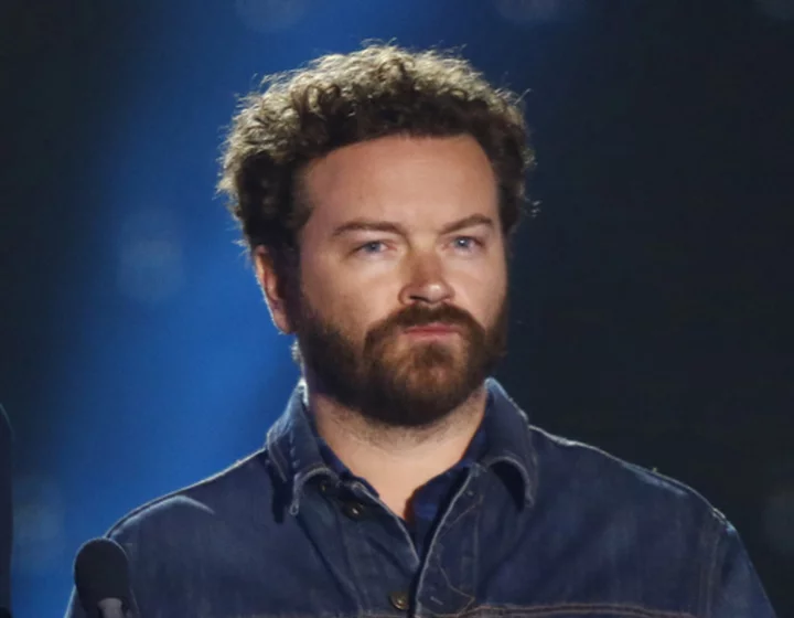 ‘That ‘70s Show’ star Danny Masterson found guilty of 2 rape counts, is led from court in handcuffs