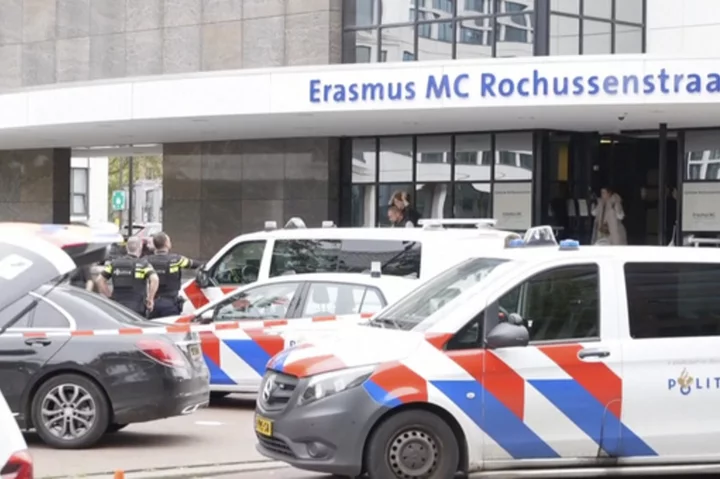 Dutch police say 2 people are killed in shootings at a university hospital and home in Rotterdam