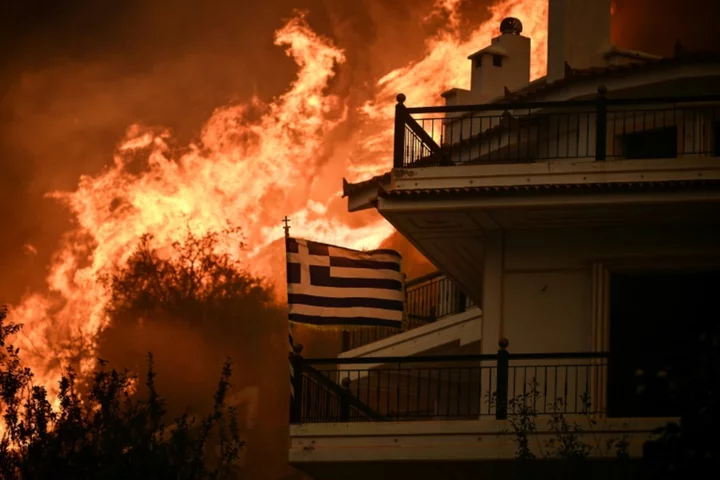 Greek firefighters battle major blazes on multiple fronts