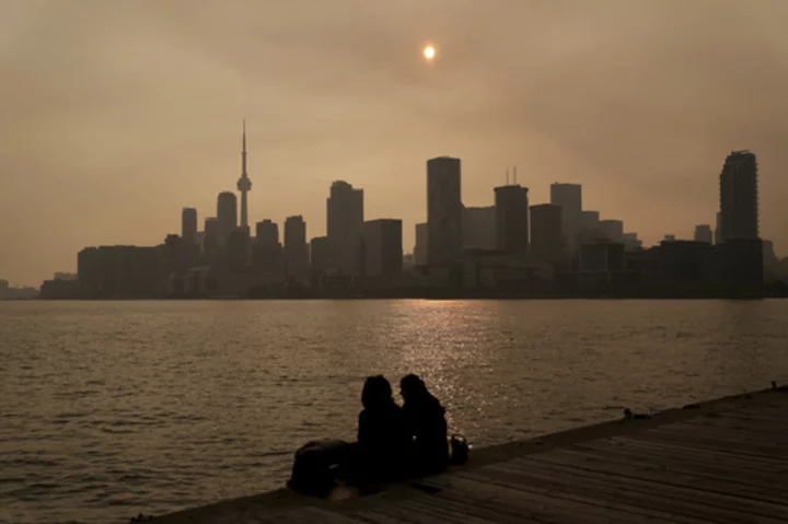 Rain hasn't quelled Canadian wildfires, and more smoky haze is on the way, officials say