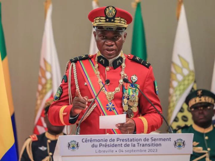 Military junta leader is sworn in as Gabon's interim president