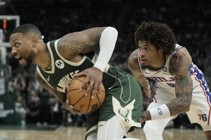 Lillard scores 39 points in his Bucks debut to help Milwaukee edge the Philadelphia 76ers 118-117