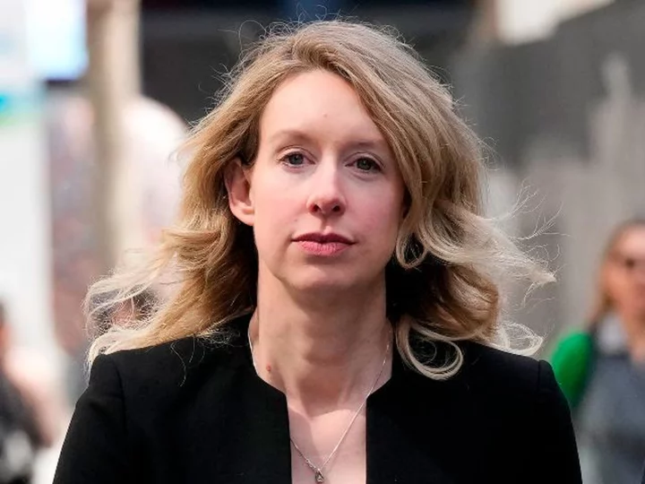 Elizabeth Holmes reports to prison