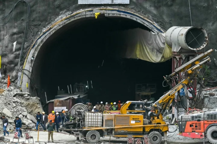 India rescuers make painstaking progress towards 41 trapped in tunnel