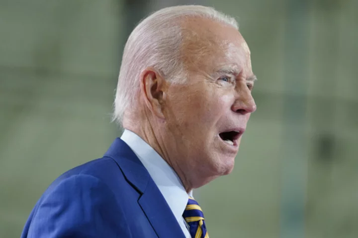 Biden launches a new push to limit health care costs hoping to show he can save money for families